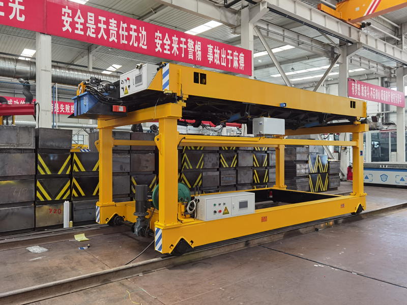 智能子母车破解卸料难题 全天候自动化方案赋能高效生产